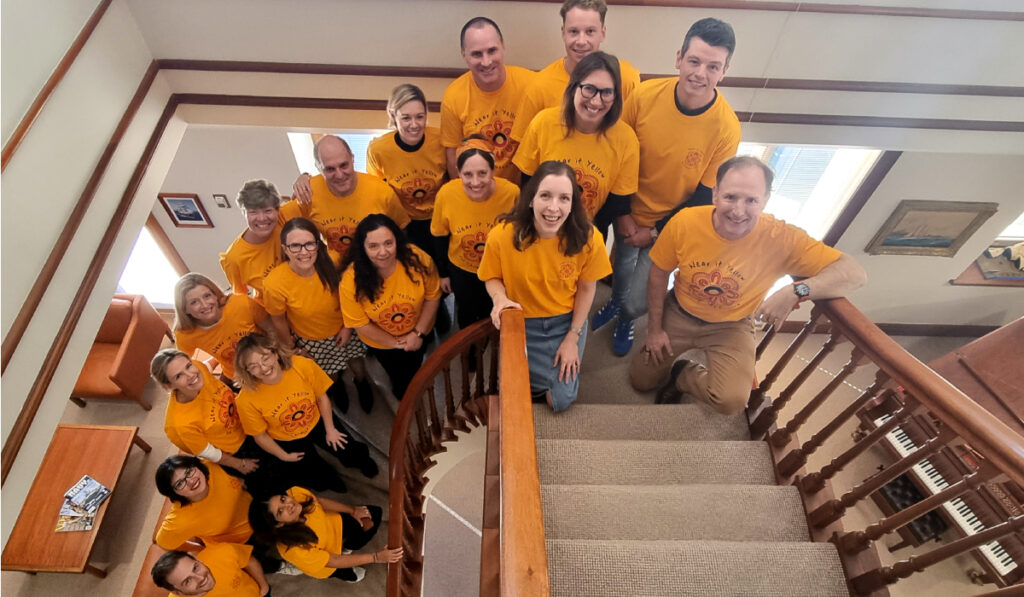 Alberts staff in Wear It Yellow Day tshirts